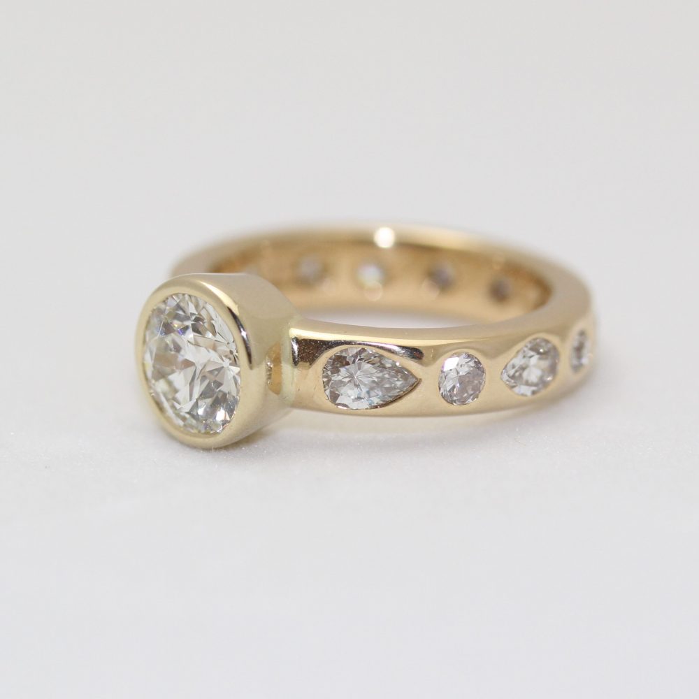Solitaire Diamond Ring with Flush Set Diamonds - Elaina Designs
